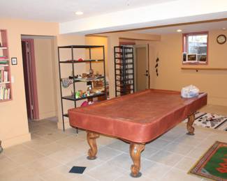 Beautiful Pool table with cover and pool cues Just in time for Christmas! (You are responsible for moving it) $700