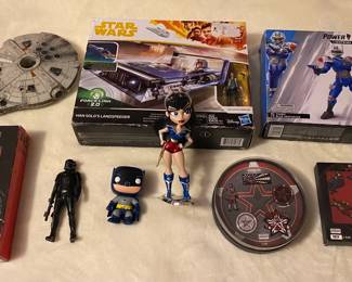 Star Wars Millenium Falcon Lights and Sound Work $50;  Han Solo's Landspeeder Force Link 2.0 NIB Box Worn On Right Side $20 ; Black Series Kylo Ren 6" Action Figure NIB $20; Funko DC Batman $20; DC Bombshell Wonder Woman Platinum Edition $100; Power Rangers Lightning Turbo Blue Senturion Figure NIB $20; Marvel Red Guardian Pin Set $10; Dr. Strange Pin Set $15.