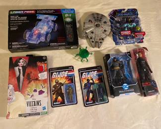 NIB Laser Pegs Race Car LED Build $30; NIB Skeletor Action Figure $20; NIB DC Multiverse Batman Action Figure $75; NIB DC Selina Kyle $10; NIB Cruella De Vil Disney Villains $20; NIB GI Joe Snake Eyes $10; NIB GI Joe MP $10.