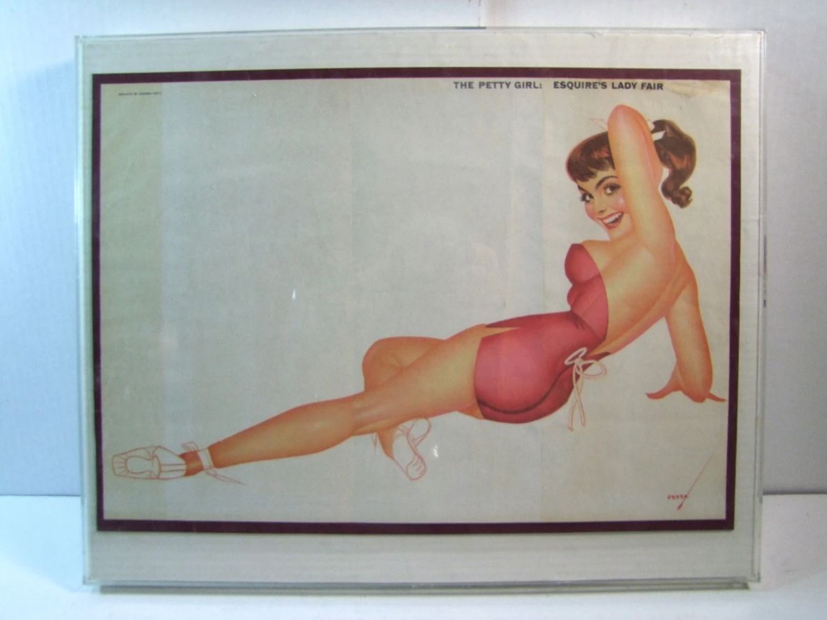 Lot 1:  C/1948 Esquire Pin-up "The Petty Girl" by George Petty (1894 - 1975) in a Plexi 3-D frame, 20" x 16".   Cond:  Minor scratches to frame, small water stain in upper right corner of print.  Est. $ 60-80.