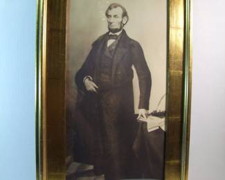 Lot 80:  1900 Engraved portrait of President Lincoln, 12" x 24" in a wide gilt wood frame 18 1/2" x 30".   Cond:  Minor wear to the frame, no print damage.   Est. $100 - $150.