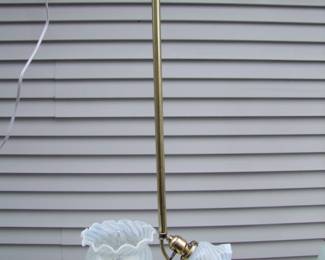 Lot 29: C/1880 Brass Hanging Gas and Electric light fixture with white opalescent swirl gas shade and white opalescent electric shade. 14" X 7" X 33" h.  Purchased from Materials Unlimited.  Cond:  Polished, lacquered and entirely rewired.  Est. $200 - 300.