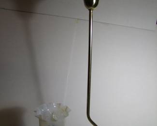 Lot 39:  C/1890 Hanging Brass Gas Lamp converted to electric with opalescent swirl shade,  30" h. x 11" w. x 6" deep.  Purchased from Materials Unlimited.  Cond:  Polished, lacquered and includes a new electrical ceiling cap for contemporary use.  No damage found.  Est. $100 - 150.