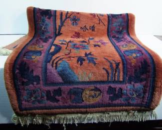 Lot 75:   C/1930's Chinese Wool Rug, hand woven, signed in the middle, approx. 24" x 48", very thick.  Cond: Small edge stain on the cotton fringe, light wear from use.   Est. $75 - 125.