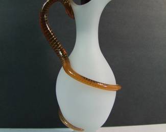 Lot 52:  Mid 19th C. Hand blown English Clam Broth glass decanter, applied amber glass snake handle and stopper, 16" h., has polished bottom foot.  Cond: Wear to the fine gilt decoration on the snake and lip, no chips or fractures.   Est. $80 - 120.