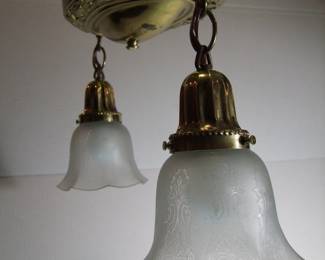 Lot 49:   C/1915 Brass Ceiling lamp fixture with pair of etched shades, 16" w. x 10" h.  Cond:  Polished, lacquered and entirely rewired.  Small fracture in edge of ceiling canopy with minor scratches and dents.  Est. $75 - 100.