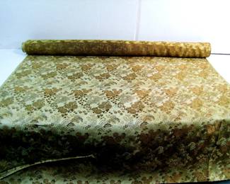 Lot 76:   C/1920 Unused roll of Asian Silk material w/metallic threads, approx. 26" w. x 3 yards?  Cond: No damage found, also comes with an extra cut-off piece.   Est. $30 - 60.