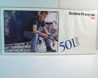 Lot 15: 1985 Rare Levi 501 Jean advertising poster w/Young Kiefer Sutherland modeling a pair of Levi’s, 27 ½” x 13” h. Note: Pre-acting period, modeled to raise money for trip to Hollywood.  Cond: No Damage, slight waviness.   Est. $60 - 100.