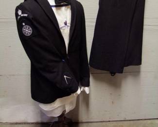 Lot 77: Royal Yacht No. 2 Uniform (H.M.Y. Britannia), pants, shirt and jacket, size approx. Medium. The uniform has a Navigator's Yeoman’s Sleeve Patch and Able Seaman Radar Patch. Documents included indicate the Uniform was worn by Mr. Stuart Arden of the Royal Navy. It was worn for 5 years until 1997 when Hong Kong was returned to China (The Royal Yacht was in port). It was purchased Nov. 13, 2003 directly from the Seaman by Captain Steven Welch of the Soo Locks in the UP.  Condition: No damage found.  (Includes a Vintage Mannequin form on oak stand)    Est. $100 - $200.