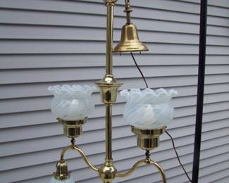 Lot 28: C/1890 Brass Hanging double gas and electric light fixture w/2 white opalescent swirl gas shades and 2 white opalescent swirl electric shades.  40" h. without chain and ceiling cap 15".  Purchased from Materials Unlimited (Architectural Antique Shop, formally in Ypsilanti MI).  Cond:  Polished, lacquered and entirely rewired.  Est. $200 - 300.