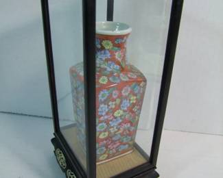 Lot 60:   Antique Asian Floral Vase in small display case on stand, signed, 6" h.  Display case 10" x 5" x 4".  Cond: No damage found.   Est. $50 - 75.