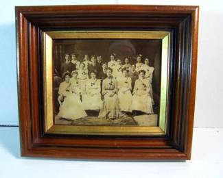 Lot 95:  C/1880 Lg. photo of Victorian Wedding Party and family, 8" x 10" in a Victorian Walnut frame with wood back, 12" x 14".  Cond: No damage found, minor wear to frame.  Est. $60-80.
