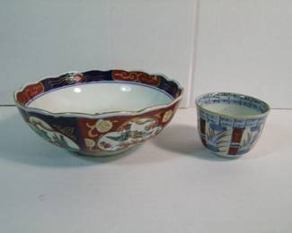 Lot 59: 2 pieces Asian Porcelain includes C/1825 hand painted cup 2 1/2" h. and Mid 20th C. Imari bowl 8" dia. x 3" h.  Cond: No damage found.  Est. $50 - 75.