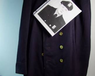 Lot 87:   1950 Detroit Police Officers Duty Coat, hat and 3 pairs of pants, size large.  Includes Xerox of Officer photo.  Cond:  Missing 1 coat button.  Est. $75-100.