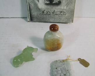 Lot 67:  3 Small pieces of Antique Jade including a carved amulet w/reprint 1910 booklet, small sitting horse and a snuff bottle w/carved relief of figures in a landscape, various sizes.  Cond: No damage found. Est. $75 - 150.