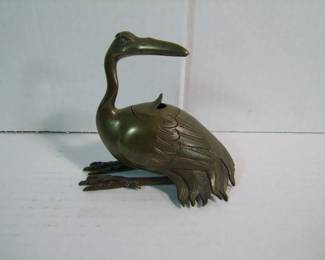 Lot 62:  C/1890 Chinese Brass Incense Burner formed as a Shore Bird, Egret? w/small vented cover, 5 1/4" x 3 1/4" x 4 1/2" h.  Cond: No damage found, darker finish.   Est. $75 - 125.