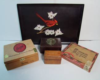 Lot 107:  1950's "Couroc" Bakelite serving tray with 4 various boxes including 2 cigar boxes, leather box with brass lion head and Italian leather playing card case.  Cond:  All have minor wear, various sizes.  Est. $40-50. 