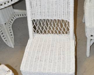 Close up View of one of the 4 Vintage White Wicker Dining Chairs Available in the Set!