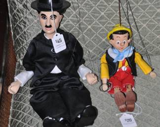 Vintage Charlie Chaplin Marionette ($45) Sitting Beside a Vintage Pinocchio Marionette. ($20-SOLD)