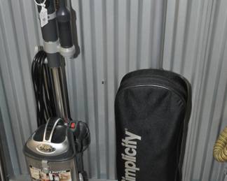 Shark Professional Navigator Lift-Away Vacuum, uv540 ($95) Shown with a Simplicity Freedom Headlight 25 Foot Cord Vacuum, F3300 ($145)