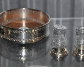 A Beautiful Vintage Kirk Stieff Silver Plate Wine Bottle Coaster Caddy ($25) Shown With 1 of 2 Sets of Quaker Hurricane NewPort Sterling Weighted Salt & Pepper Shakers with Etched Glass Embellishments. ($15/Pair)