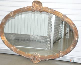 Made by the Carolina Mirror Company, This Vintage Gilded Carved Mirror with Shell Design is Stunning! ($195).