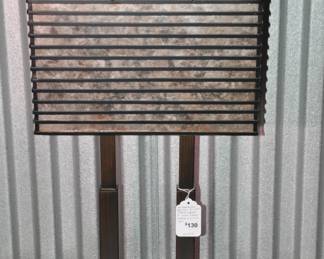 This Unique Contemporary Uttermost Becton Lamp is a Show-Piece on its Own. (28.5" H) The Geometric Bronze Metal Base in Oil Rubbed Bronze is Complimented with a Mica Ribbed Shade. 28.5" H x 14"W x 7"D, ($130).