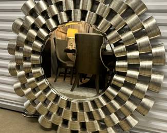 Uttermost “Taurion” 09136 47” Round Mirror Will Be The Focal Point of Any Room! Made of Staggered Rows of Enclosed Tubing With Each Row Graduating in Size. The 3-dimensional Open Design has A Lightly Distressed Silver Finish With Black Undertones 46” Round, $275.