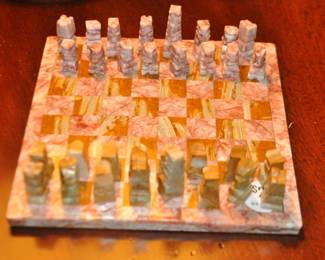 Miniature 7 1/2” Hand Carved Aztec Marble Chess Set, ($22)