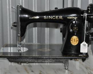 Vintage Singer Sewing Machine that is Classic and in Working Condition, Serial No. JC23151G, ($95).