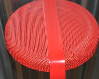 Up-Close View of the Red Perforated Lamp Shade