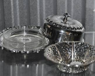 A Full Image of all 3 Pieces of the Silver Plate Butter Dish, Base, Lid & Glass Insert ($30) beside a Woven Silver Plate Bowl.