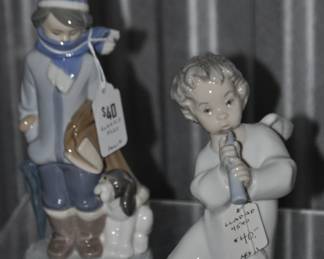 Love Lladro's? We Do! Pictured Are the "Winter Boy" #5220 and the "Angel With Pipe" #4540 Both in Brand New Condition and are an Excellent Addition to Your Holiday Decor. Each Priced at $40.