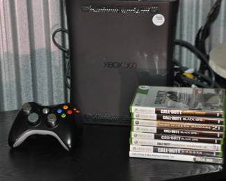 XBox 360 Elite 120GB Limited Black Console, Bundled with All Cords and 2 Wireless Controllers. ($100) Also Available are 8 Call of Duty Games, 12 Additional Games and Finally 2 Additional Wireless Controllers, sold as a Pair ($30). All sold Separately