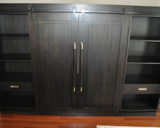 Phenomenal Liberty Furniture “Abbey Collection” Industrial Style Entertainment Center with Piers and Barn Door, Made in USA. Overall Dimension: 10’ W x 79”H x 18”D Retail $8500 ($2795)