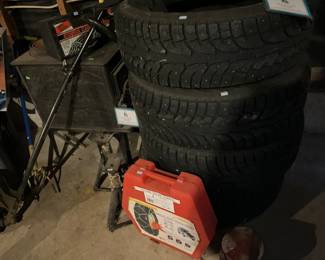 Studded tires (Hankook 235/65R16 103T) - four, in great shape