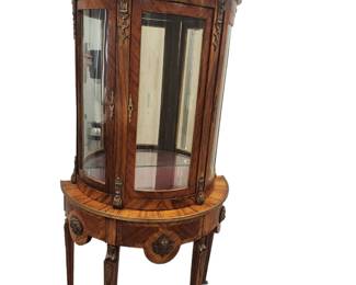 Ornate French lighted curio With beautiful Medallion.Approx 6foot6