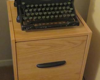 Antique typewriter, file cabinet