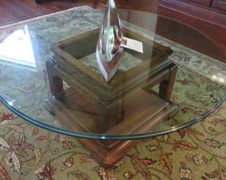 Round glass top cocktail table
