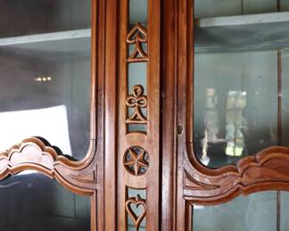 Antique card-themed china cabinet