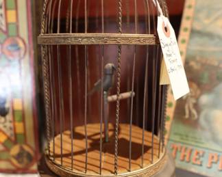 Antique singing bird in a cage, automaton