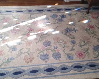 Wonderful hooked rug in the entry way