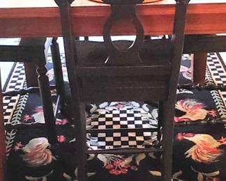 Pretty black rug with chickens