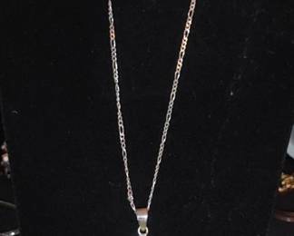 Several Mayan calender sterling silver pendants all just alike. Stunning Diamond cut sterling chains