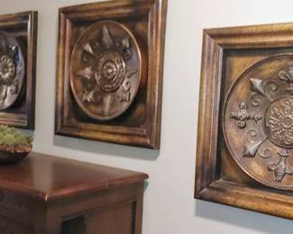 4 ornate metal wall hangings 