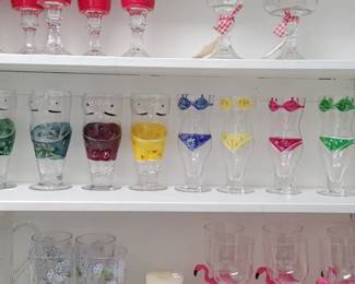 A Set Of  4 Torso Bikini Beer Glasses Hand painted & set of 4 Torso beer belly man bathing suit beer glasses! 
Hand blown & hand painted