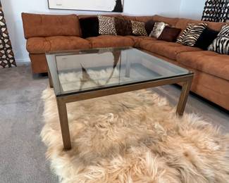 It’s exceptional mid century modern coffee table and the classic large square shape… Heavy metal body with a glass top and in great condition