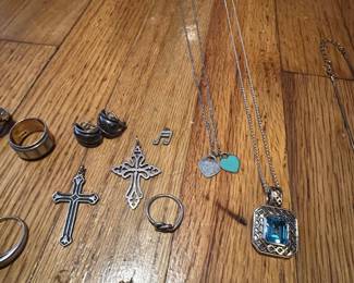 Above: Both crosses, Huggie  Earrings, music note charm, & the Bow ring are all James Avery cast in sterling silver… The ornate piece to the right is signed and it’s sterling & 10k gold.