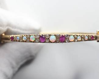 Sold at Auction: 18k LV Style Diamond Bracelet