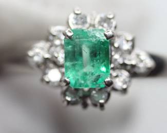 NATURAL EMERALD RING SET IN SOLID PT900 PLATINUM WITH DIAMOND HALO .74CTW, 4.16 GRAMS, SIZE 7

